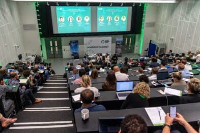 Shot of the audience and panel at the first Jawdrop Summit: ClimateTech, held at the MSHR Building in White City Innovation District on Thursday 13th July 2023