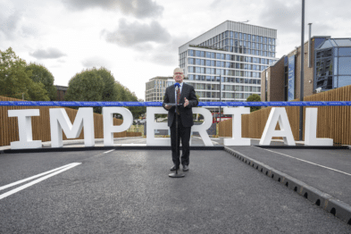 Imperial President Hugh Brady pictured speaking in front of Imperial signage at the opening of the new White City bridge.