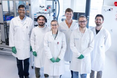 Image of the Solve Chemistry team pictured in white lab coats.