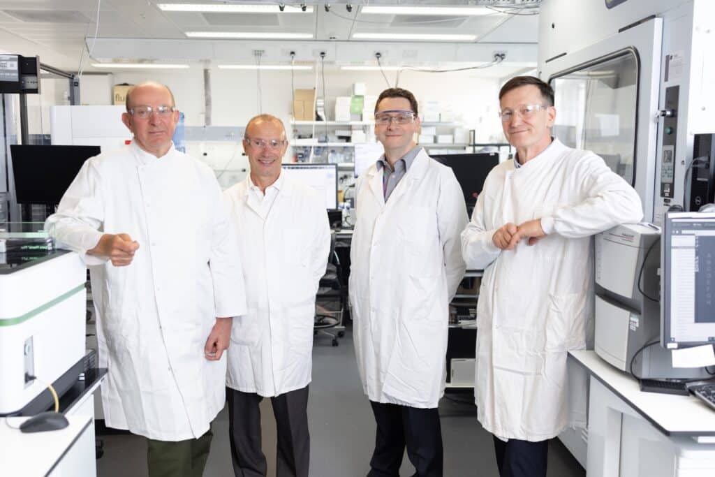 Senior team from Myricx Bio pic turned in white lab coats.